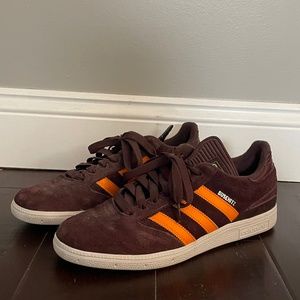 Men’s orange and brown Adidas Busenitz